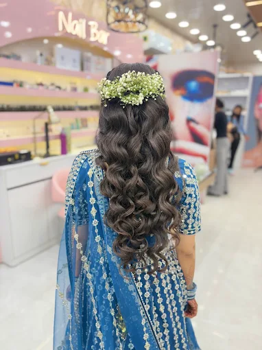 #One salon soft curled hairstyle with floral styling
